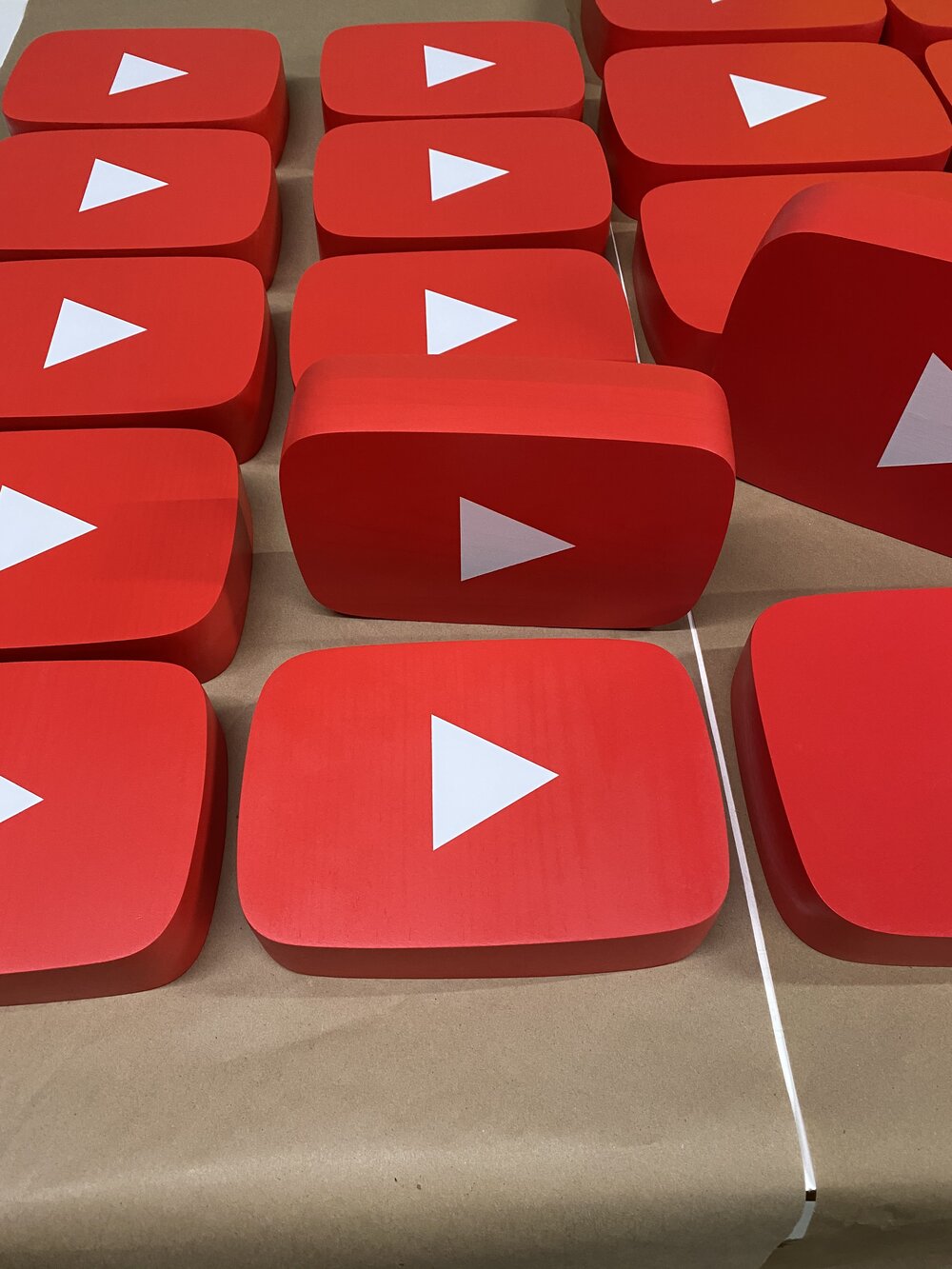 Laser cut, sanded, painted YouTube freestanding logos.